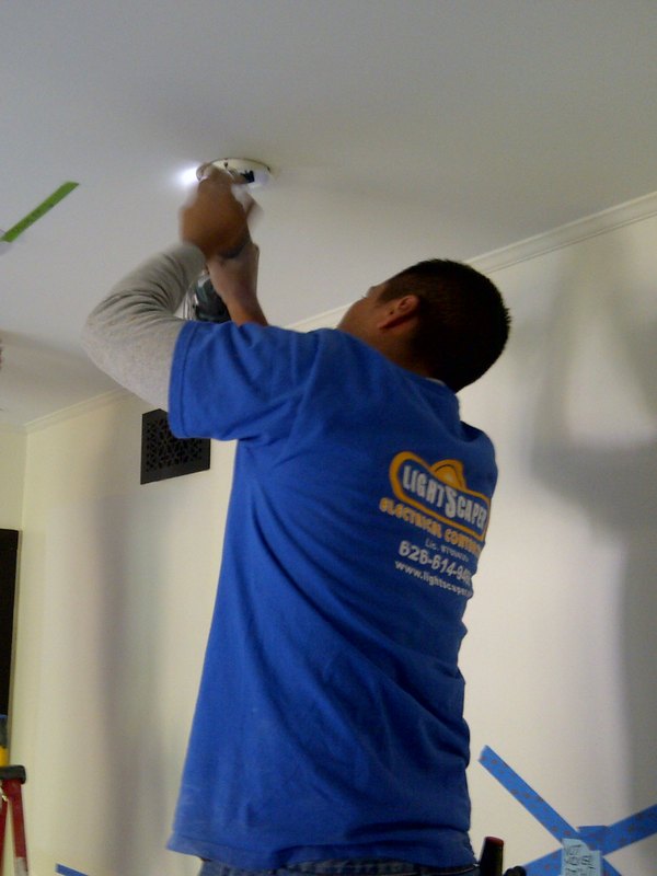 Meme installing ceiling lights