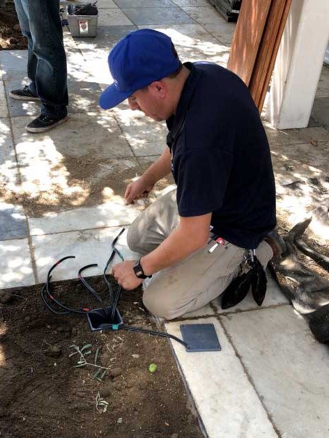 Rene installing low-voltage lighting