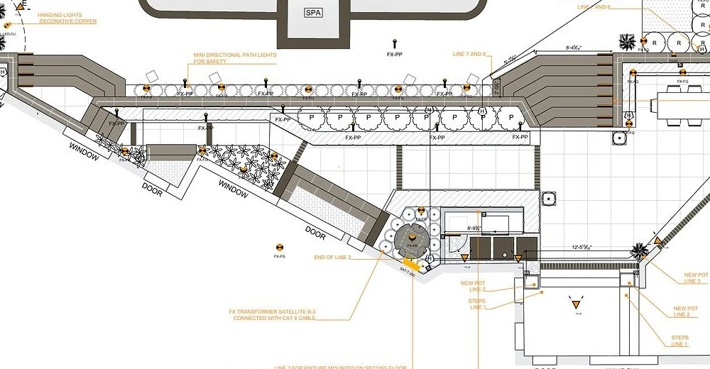 A lighting plan with fixture symbols, circuit notes and callouts