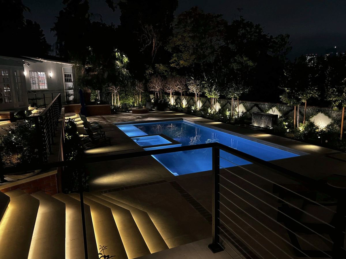 Lit pool terrace glowing stone steps