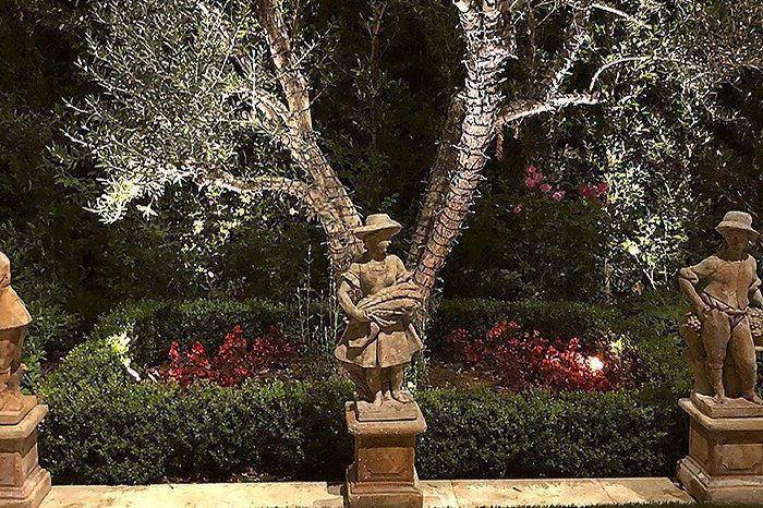 Statuary, hedging, and a lily pond.