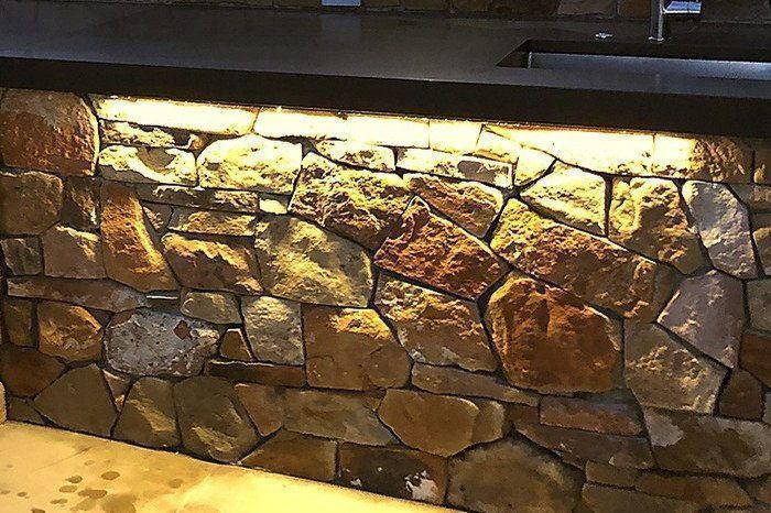 Stone & Masonry lit at night